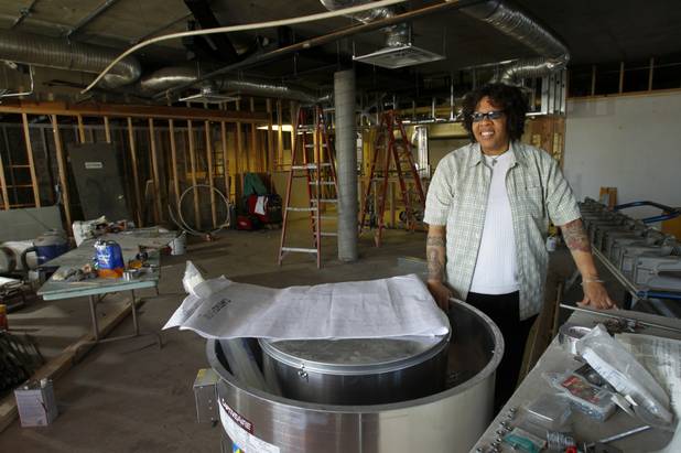 Chef Natalie Young poses at the site of her restaurant "Eat," under construction at Carson Avenue and 7th Street, in downtown Las Vegas Monday, July 23, 2012. The new breakfast and lunch spot is expected to open in September, she said.